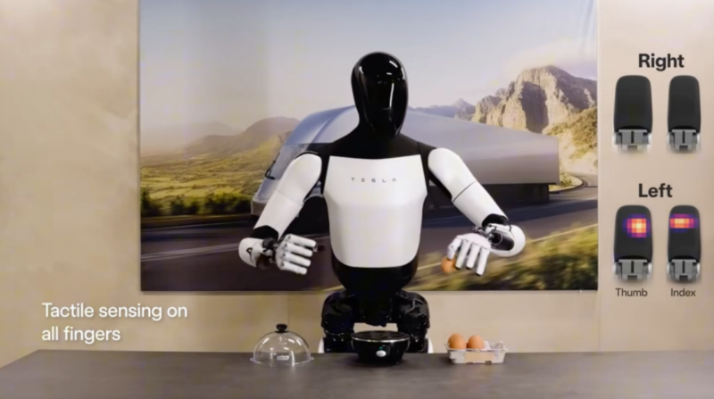 人形機(jī)器人手拿雞蛋